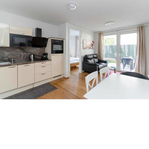 Modern apartment with tiny garden near city center